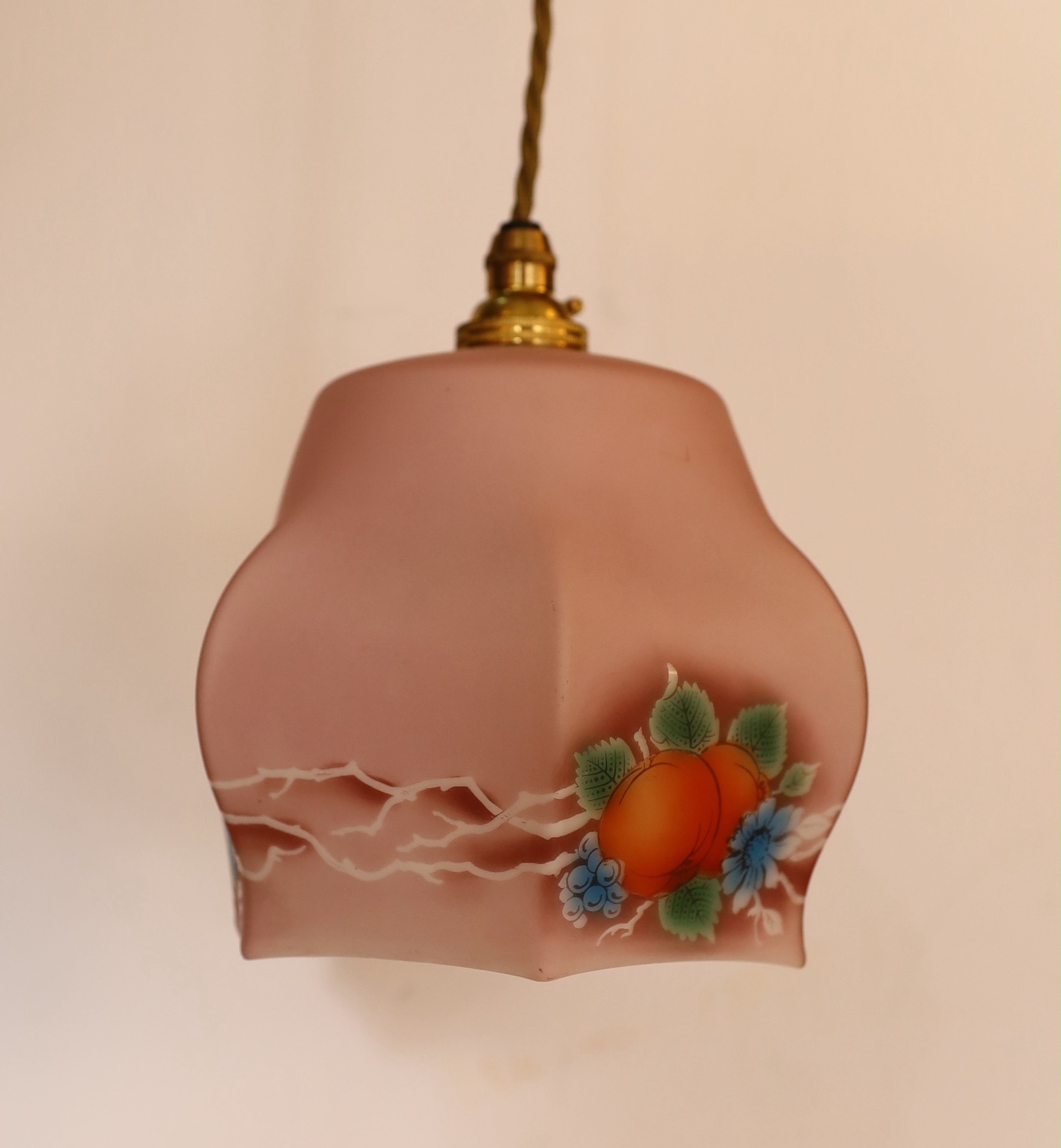 A 1930s frosted pink glass hexagonal lampshade with pendant fitting, height 18cm. width 14cm